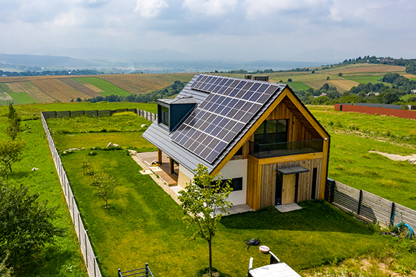 Eco,House,With,Sun,Panels,Energy